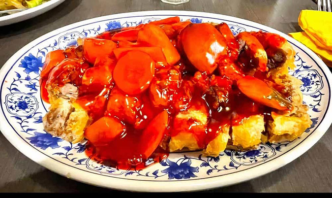 Deep fried Duck with sweet and sour sauce