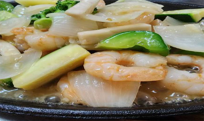 Sizzling king prawns in garlic butter sauce (GF)