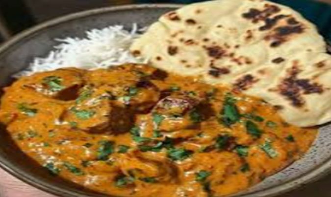 Any 2 Half Curries + Rice + Naan or Garlic Naan