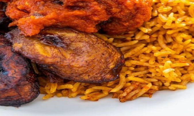Jollof rice, plantain, & coleslaw