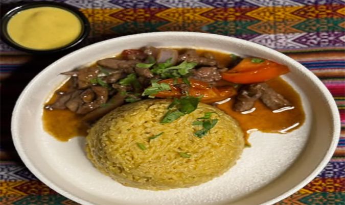 Creamy huancaina risotto with lomo saltado