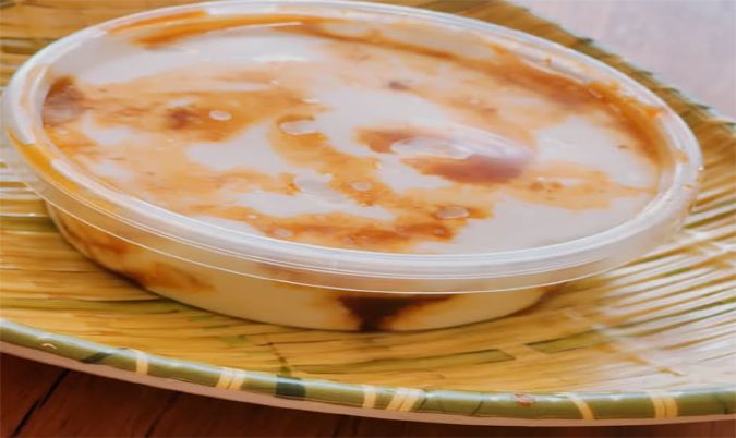 Curd with kithul treacle